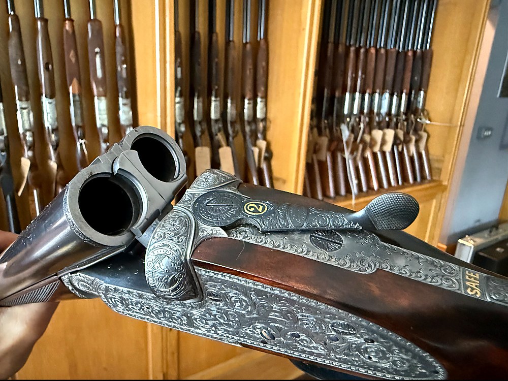 Detail of a side-by-side shotgun's engraving